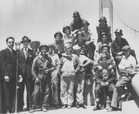 CBS correspondent Edward R. Murrow (second from left) and workers celebrating opening of the Narrows Bridge, July 1, 1940 GHPHSM, Bashford 2709