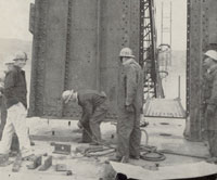 Setting tower base plate, 1948 WSDOT