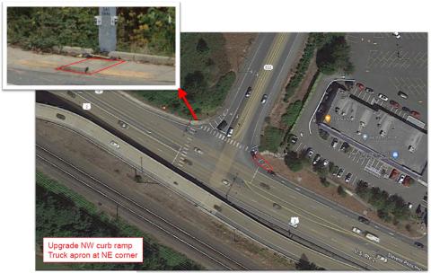 An overhead photo with red lines showing where truck aprons and a curb ramp will be build on the northwest and northeast corners of US 2 and SR 522.