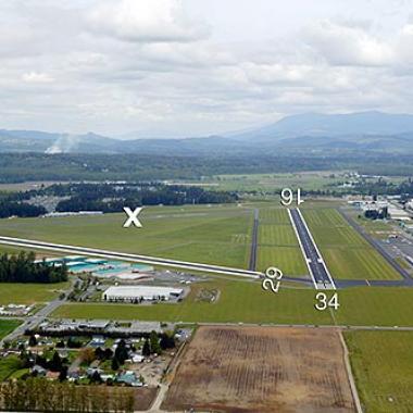 Arlington Airport Runway located on flat grasslands near the city center.