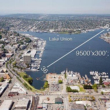 Lake Union SPB runway located on the water surrounded by the city.