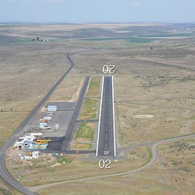 Odessa Airport Runway located in a flat, deserted area.