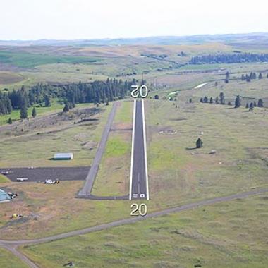 Rosalia Airport Runway located in a flat grassy area.
