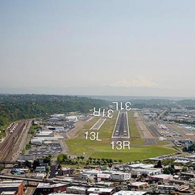 The Boeing Field Airport Runway is located near the city center and freeway.