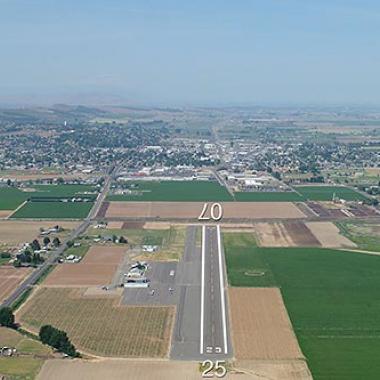 Sunnyside Airport runway located on flat grasslands.