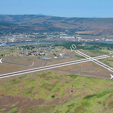 The Dalles Airport Runway located in a plain grassland.