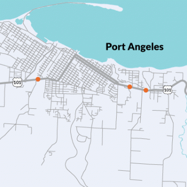 Map of US 101 along a body of water in Port Angeles with three orange dots showing where fish passage barrier correction will take place
