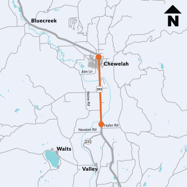 Two orange dots are connected by an orange line on a gray map of US 395 through Chewelah. The dots are located at Hafer Road to the south and Sand Canyon Road to the north. 