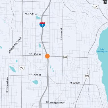 An orange dot on a map shows where WSDOT will build fish-passable structures under I-5 in Seattle/Shoreline.