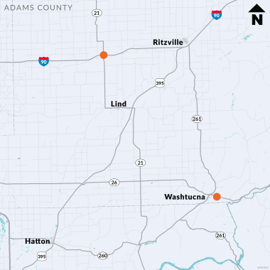 Two orange dots located on a map of Adams County to indicate location of bridges that will be repaired. One dot is on I-90 at the SR 21 crossing. The other dot is located on SR 26 in Washtucna.