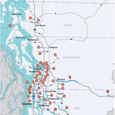 A map showing red dots in the locations of pavement preservation throughout King, Snohomish, Whatcom and Island counties.