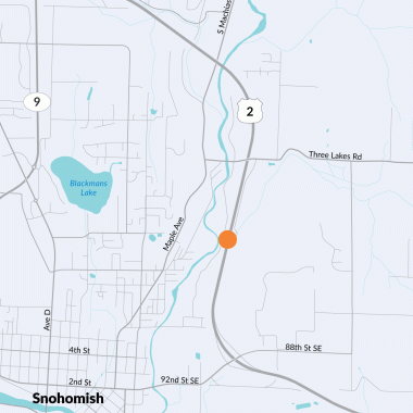 An orange dot on a map shows where WSDOT will build a fish-passable structure under US 2 near Snohomish. 