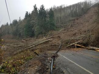 Temporary water line placed by Clallam County PUD following the closing of SR 112 at Clallam Bay