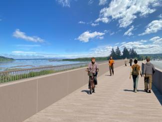 A conceptual photo of a shared-use path for walkers and bicyclists next to a highway