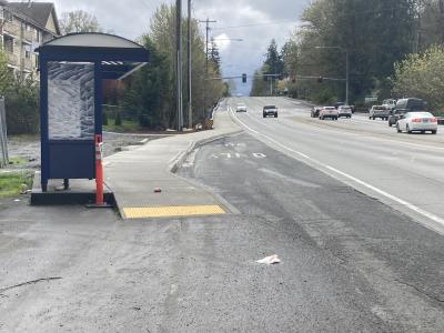 An image of the bus station on SR 900 and the new sidewalk that connects it with an existing crosswalk at 68th Avenue South.