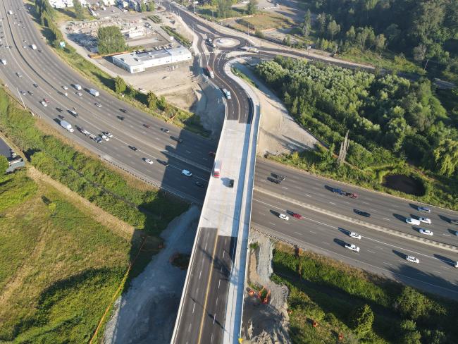This is an aerial view of the new Wapato Way East Bridge over I-5 in Fife and the connecting SR 99 roundabout.