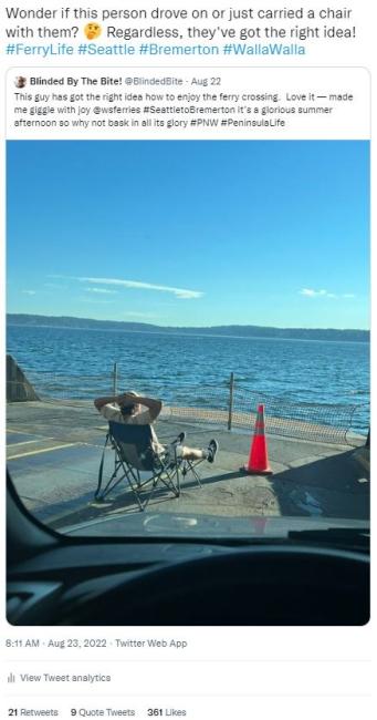 Screenshot of a quote retweet from @wsferries showing a person sitting on a folding chair relaxing on the car deck of a ferry on a sunny day
