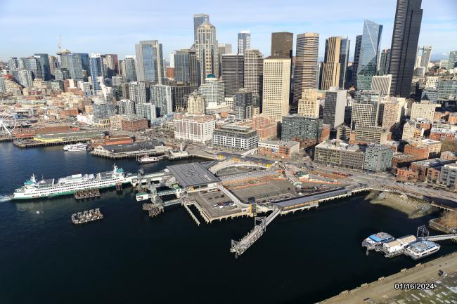 Aerial view of Colman Dock, Alaskan Way, and downtown Seattle January 2024.